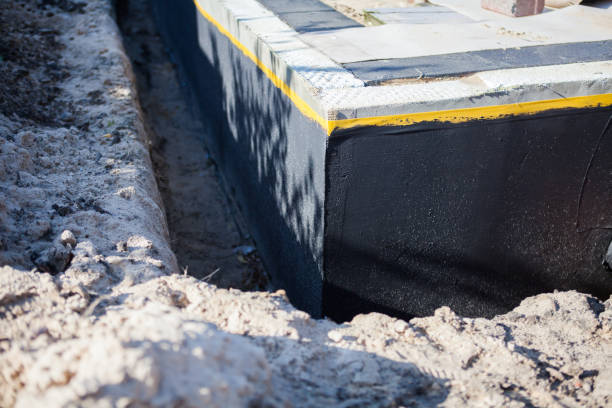 Professional Emergency Waterproofing technician working in Greenvale, NY